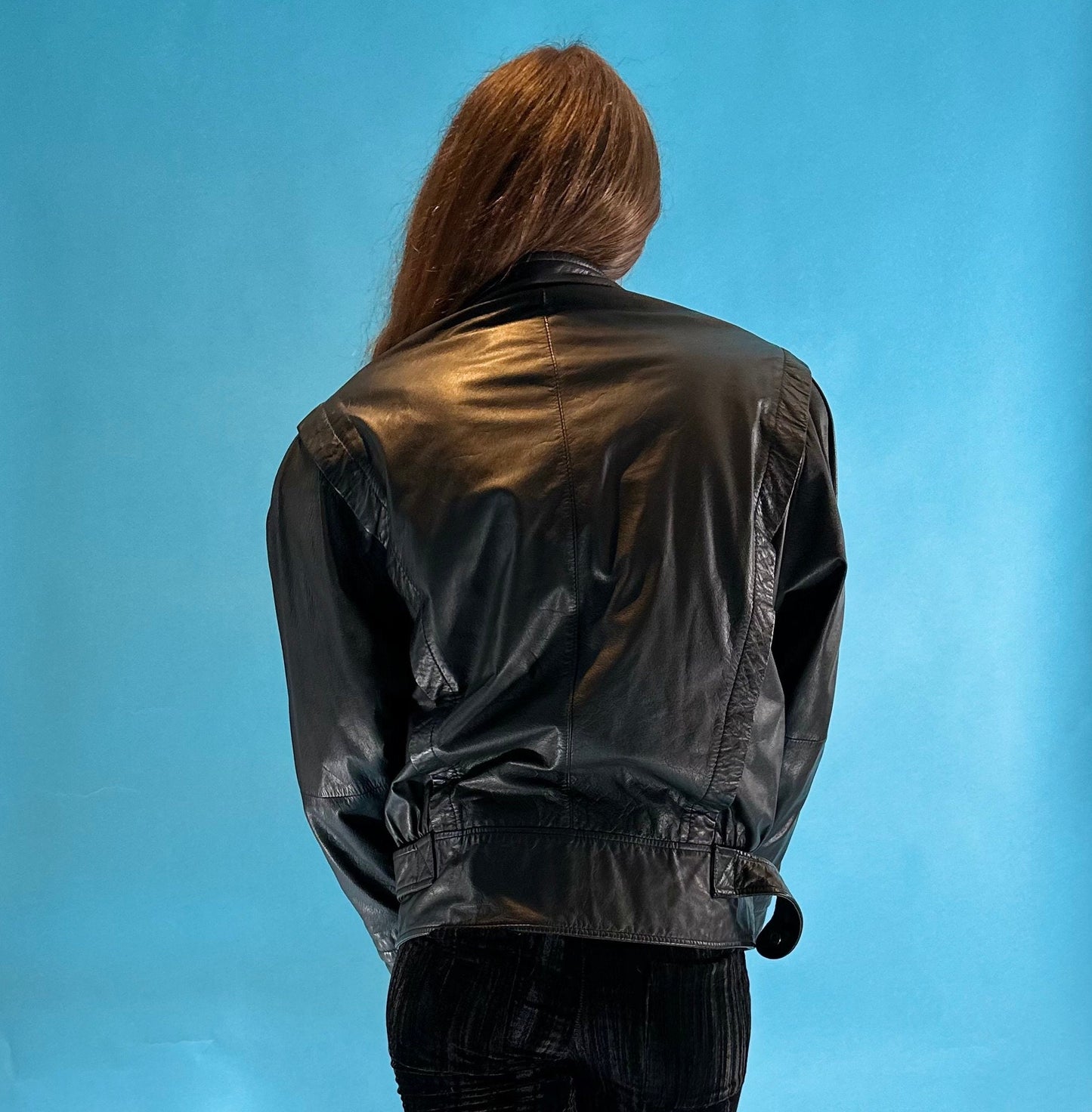 Vintage 1980s Black Leather Biker Jacket with Dolman Sleeves and Pop Button Up Details.