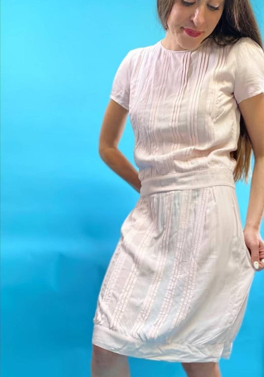 Pale Pink Knee Length Dress with Pin-tuck Pleats and Capped Sleeves.