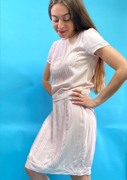 Pale Pink Knee Length Dress with Pin-tuck Pleats and Capped Sleeves.