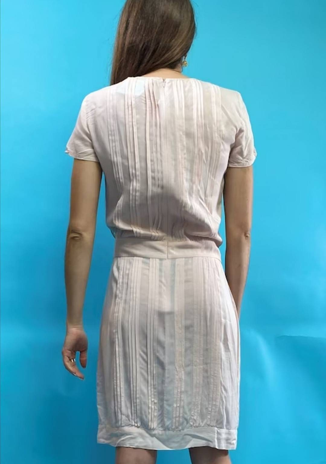 Pale Pink Knee Length Dress with Pin-tuck Pleats and Capped Sleeves.