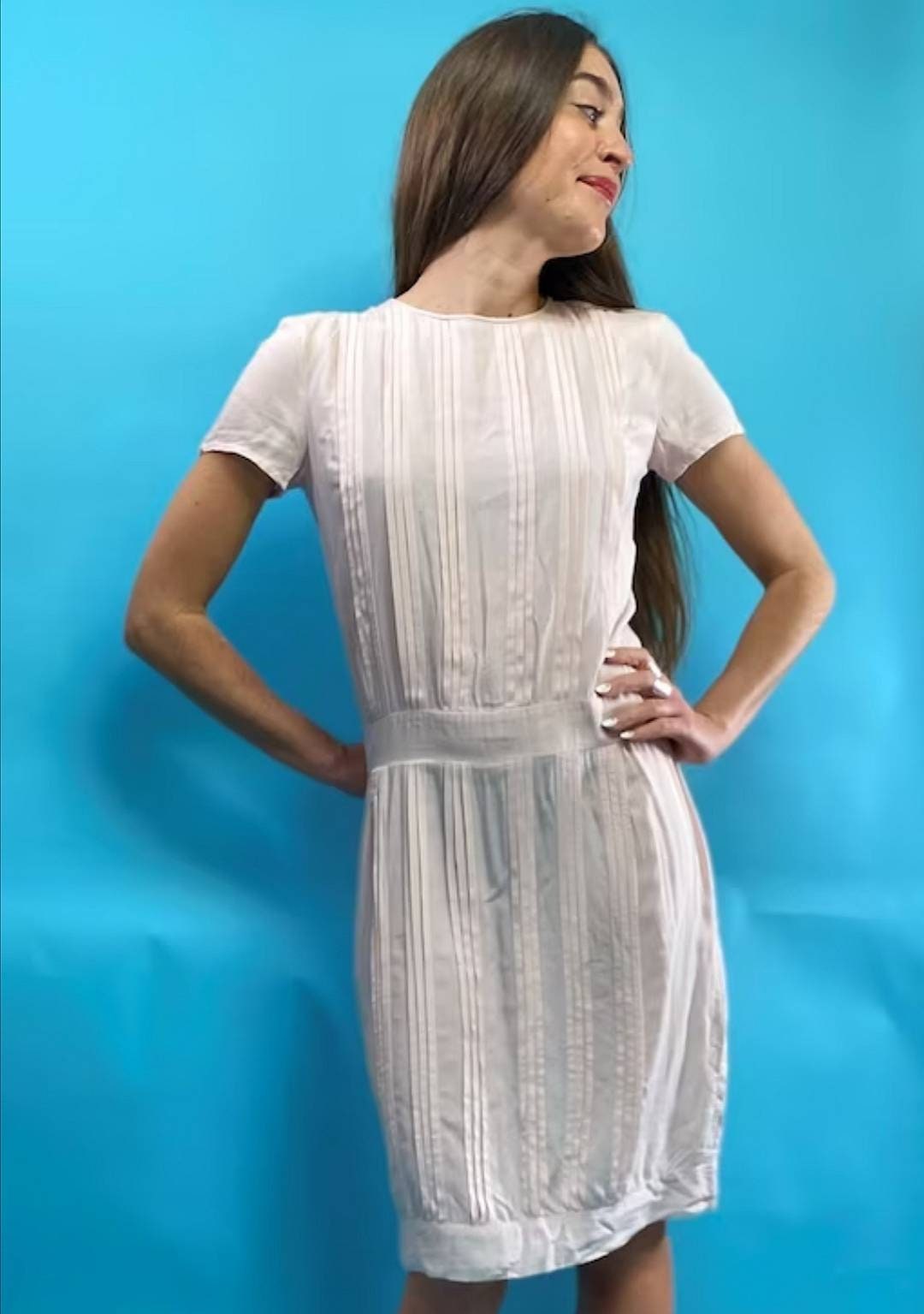 Pale Pink Knee Length Dress with Pin-tuck Pleats and Capped Sleeves.