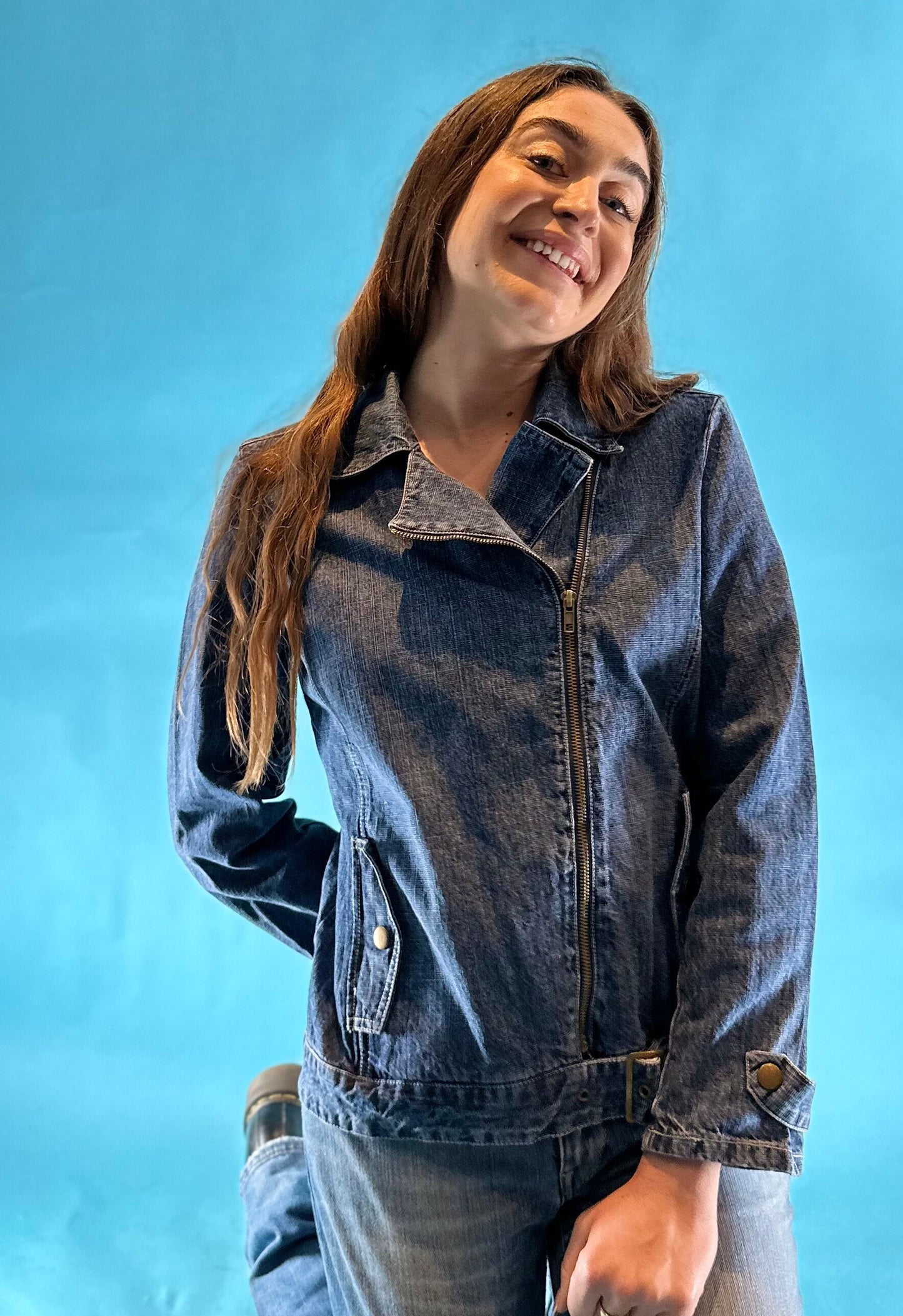 Vintage Y2K Denim Asymmetric Zip Up Biker Style Jacket with Belt and Pocket Details.