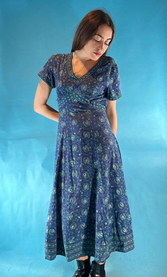 Vintage 1970s Blue Green Block Printed V Neck Short Sleeved Midi/Maxi Folk Dress with Tie Back.