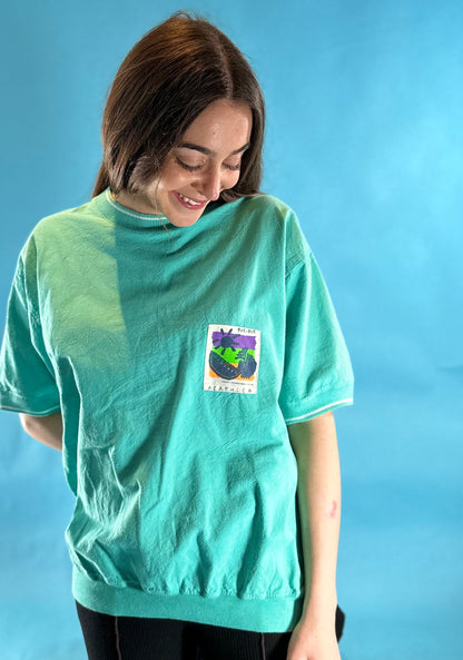 Vintage 1990s TuneSqaud Logo Mockneck Cuffed T-Shirt.