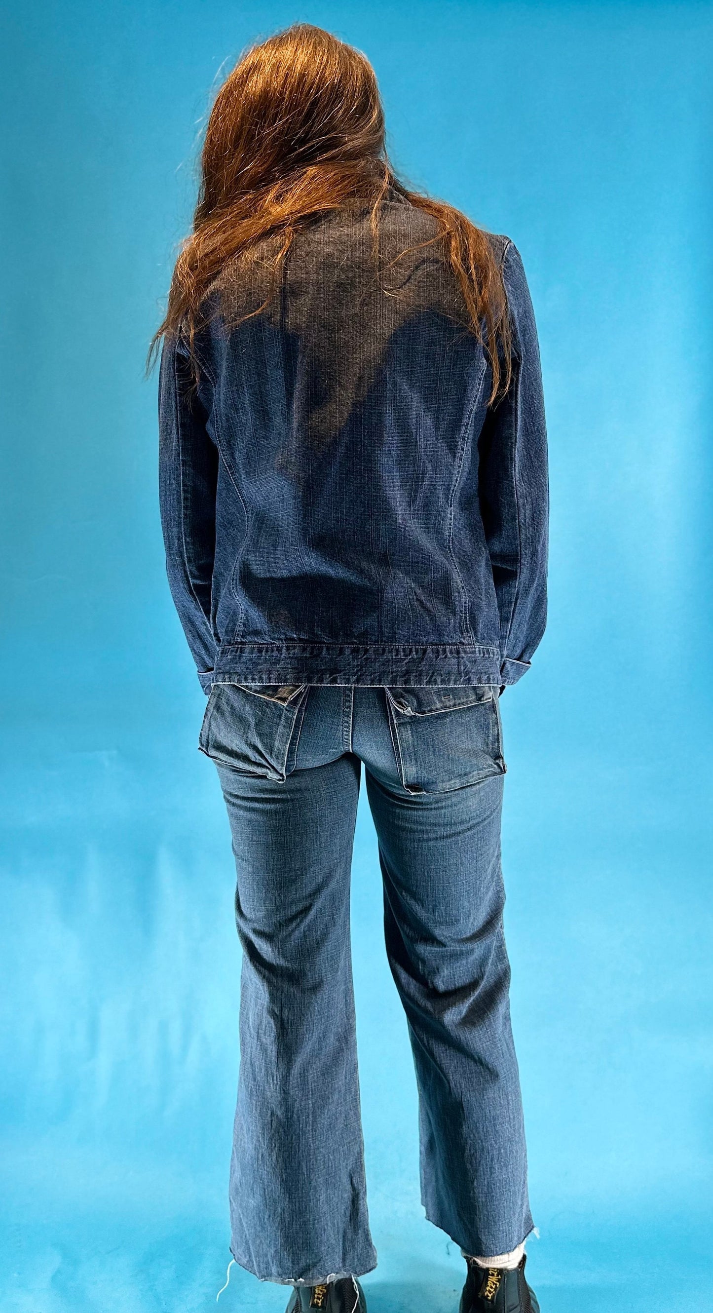 Vintage Y2K Denim Asymmetric Zip Up Biker Style Jacket with Belt and Pocket Details.