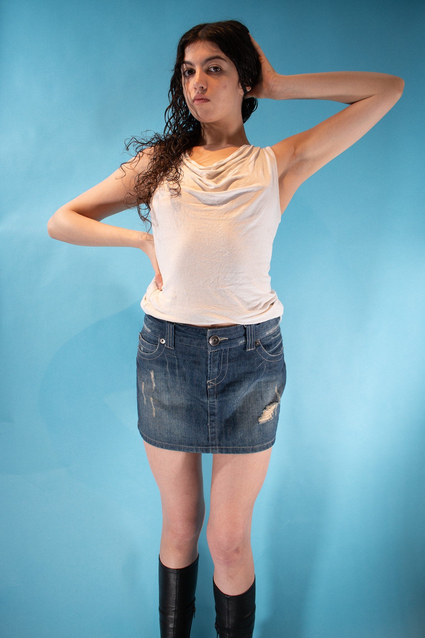 Vintage Y2K Size M 90s Mini Distressed Belt Skirt in Dark Wash Denim.